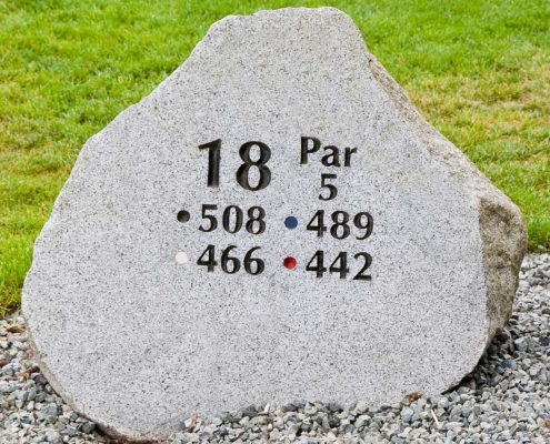 stone marker list the par of a golf hole